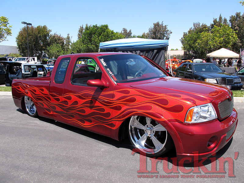 Red Flame-painted Pickup Truck — Outdoor