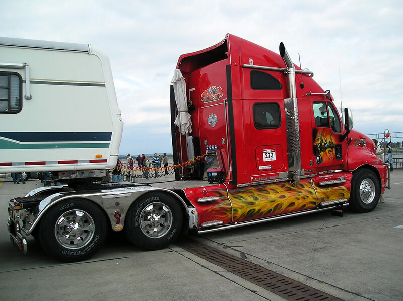 red flame truck with trailer