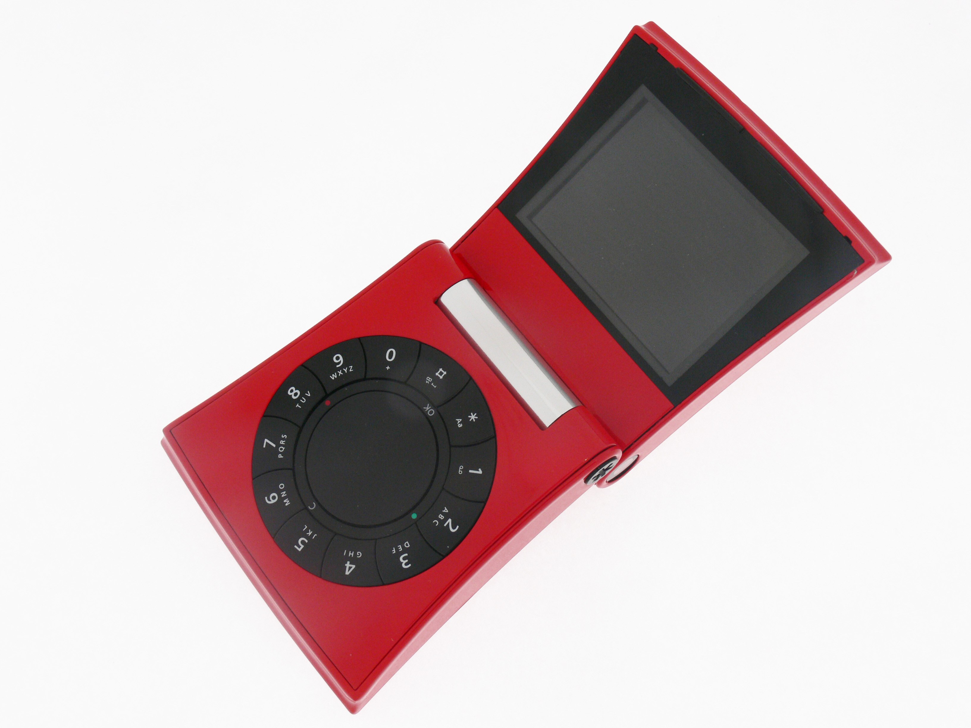 red flip phone with rotary keypad
