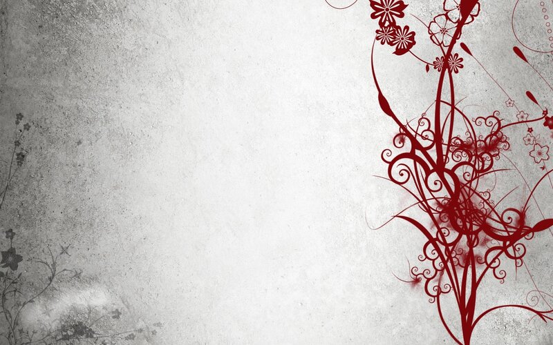 Red floral design on concrete