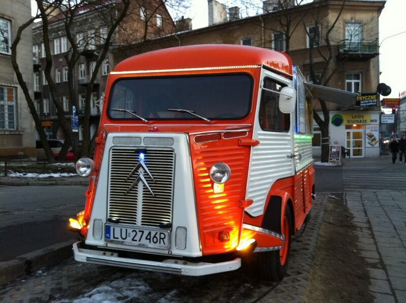 Red food truck on city street