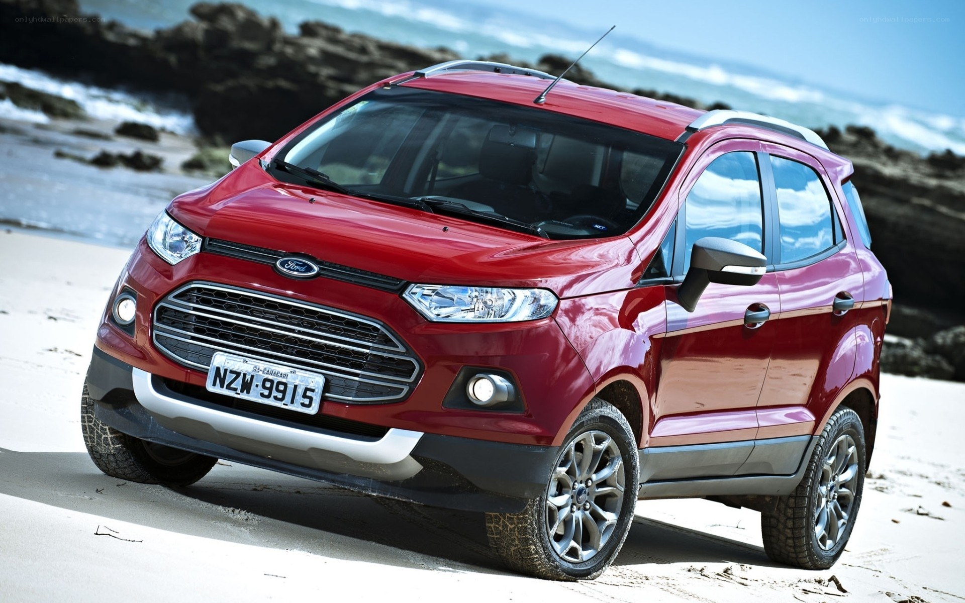 Red Ford EcoSport on beach