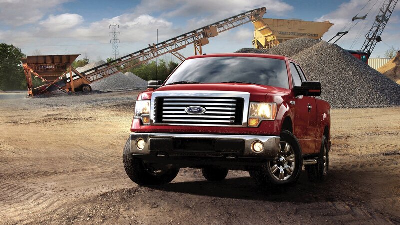 Red Ford F-150 in construction site