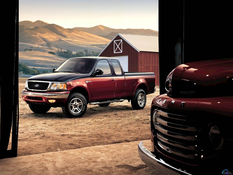 Red Ford F-150 on farm