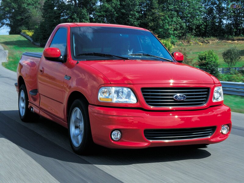 Red Ford F-150 pickup truck