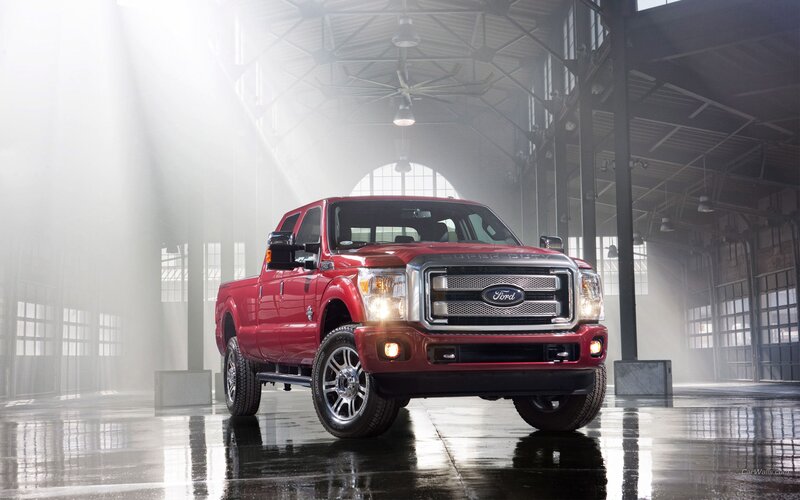 Red Ford F-250 in a warehouse