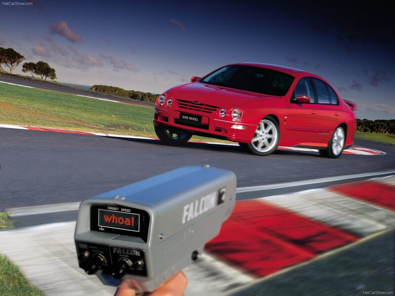 Red Ford Falcon XR8 on a racetrack