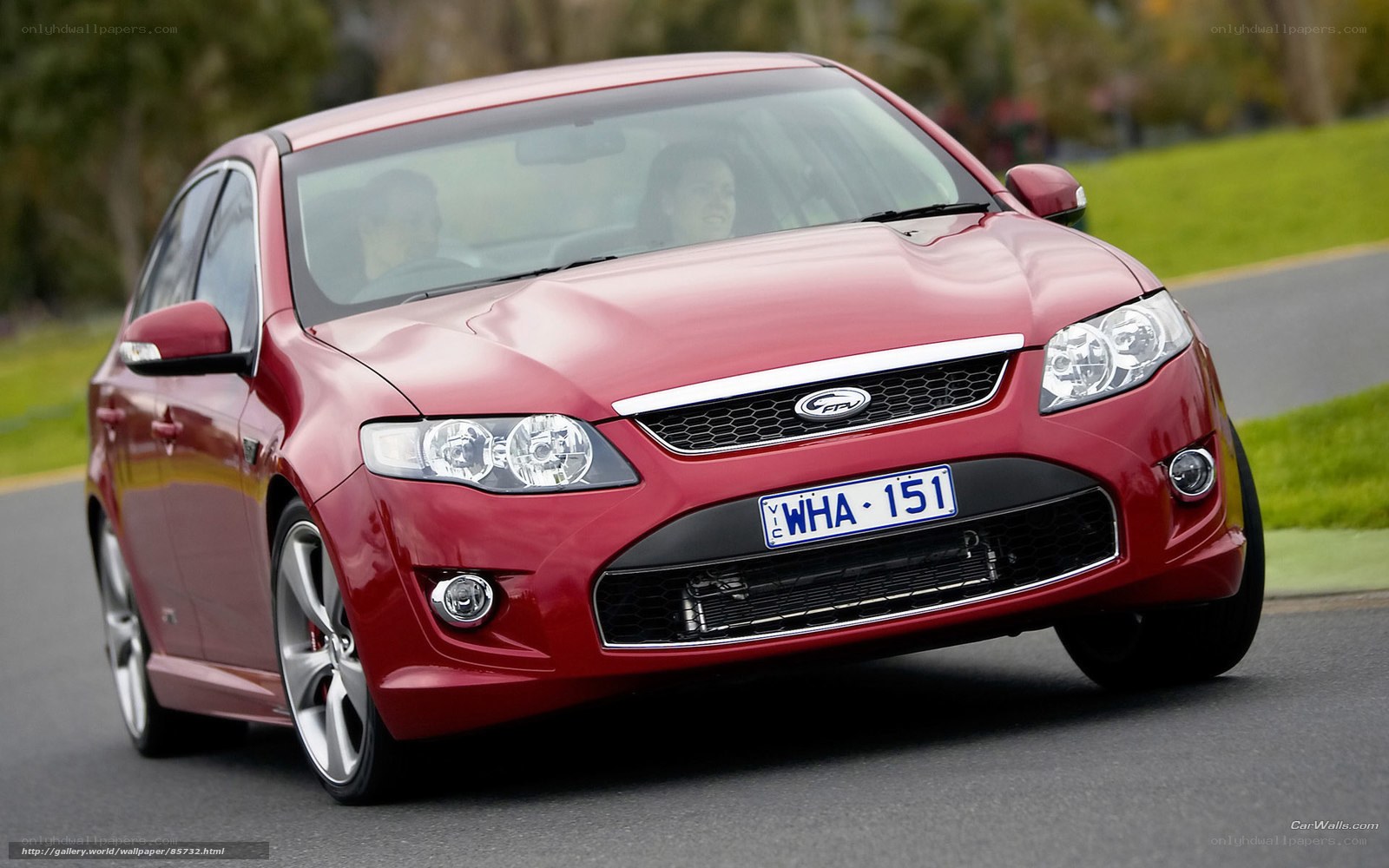 Red Ford FG Falcon in motion
