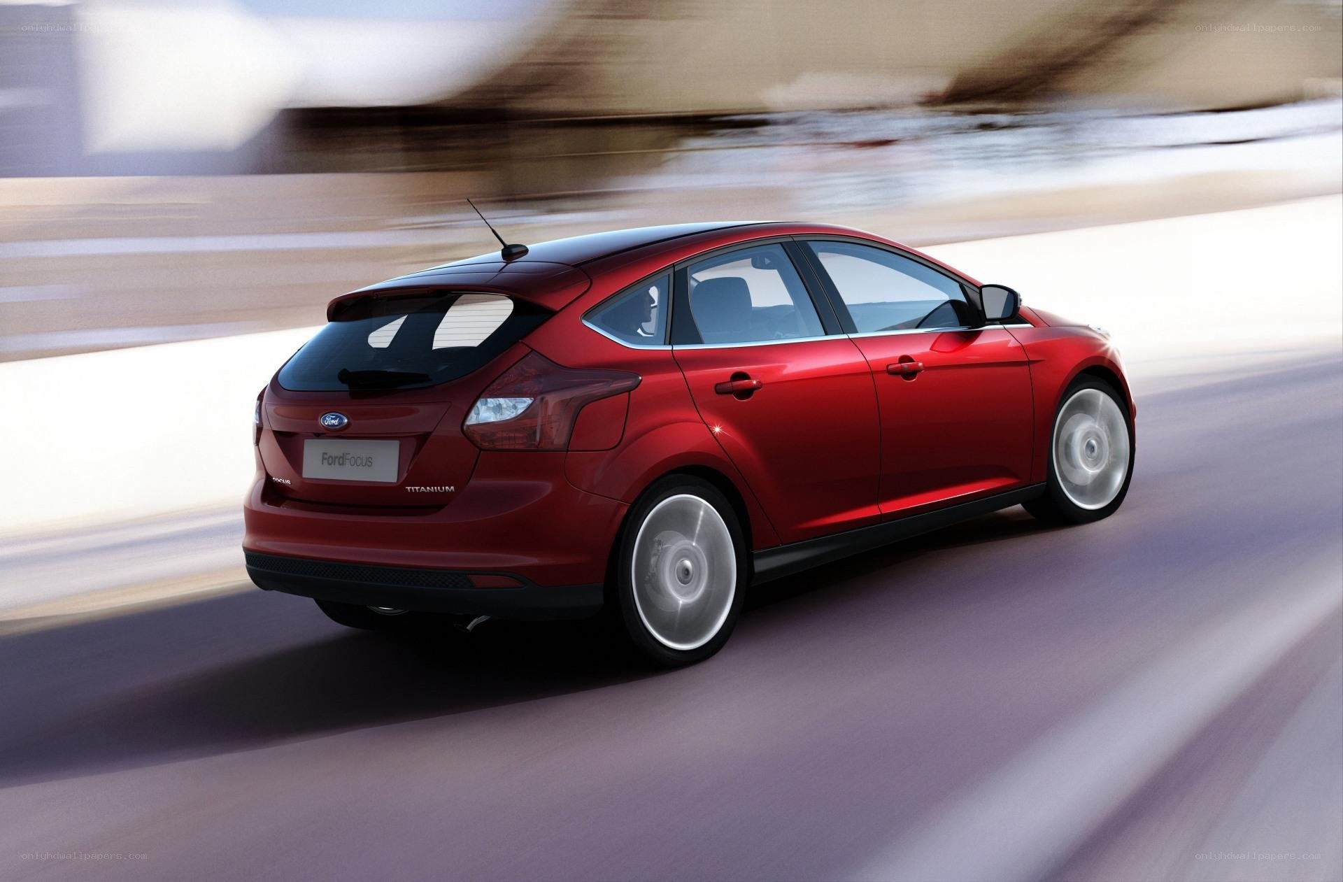 Red Ford Focus in motion