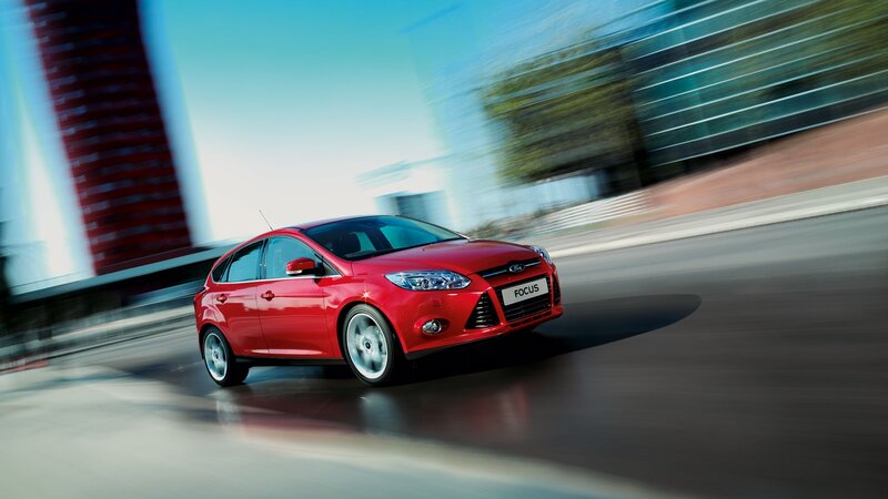 Red Ford Focus in motion