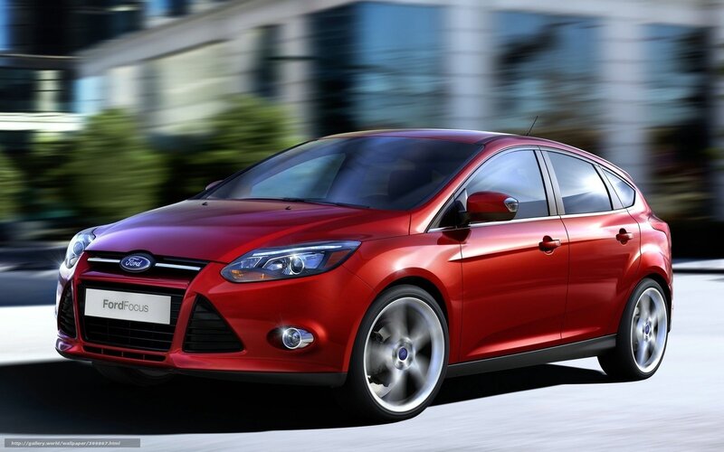 Red Ford Focus in motion