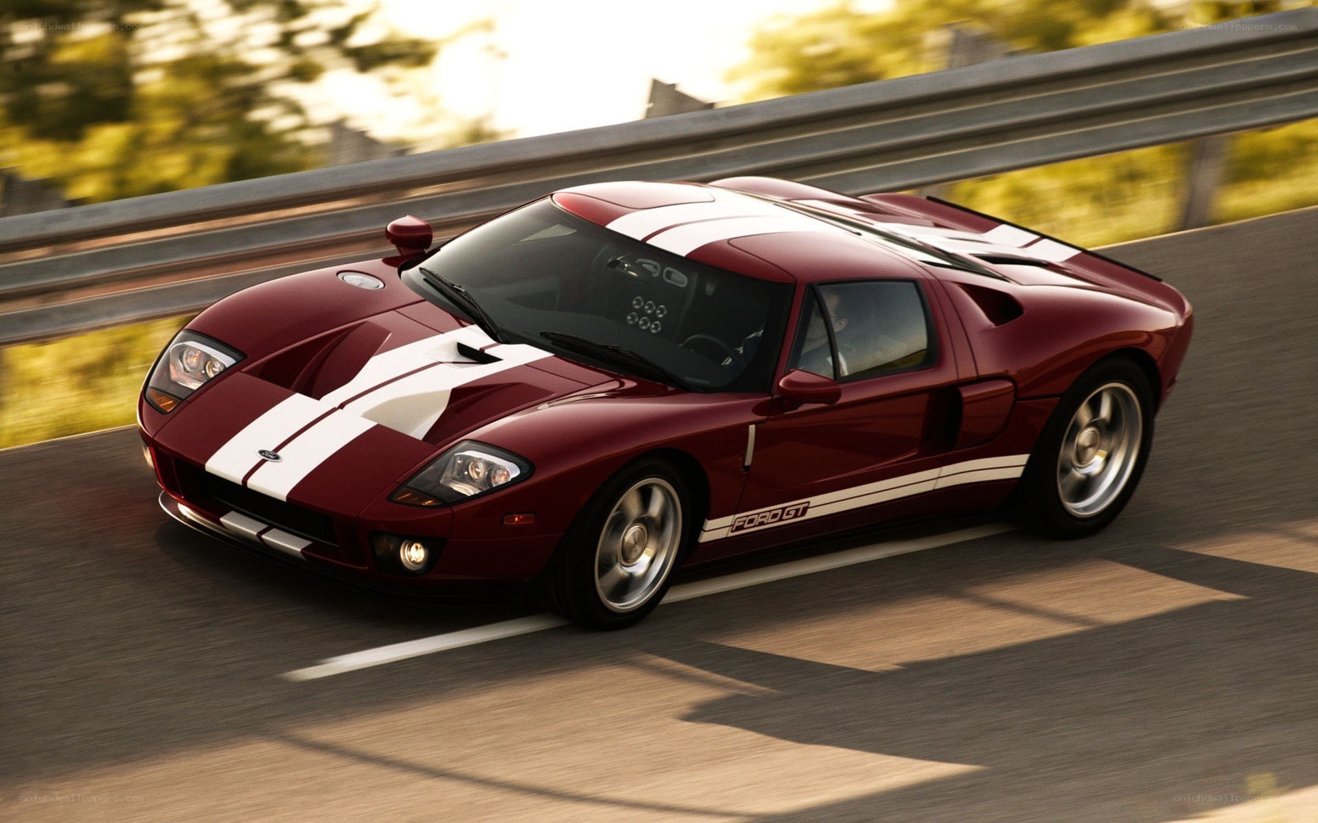 Red Ford GT on a road