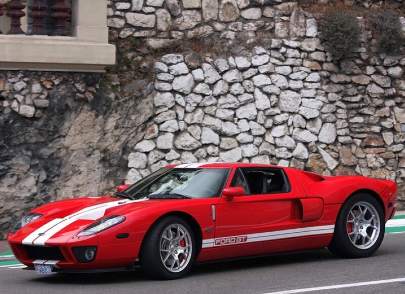Red Ford GT on a road