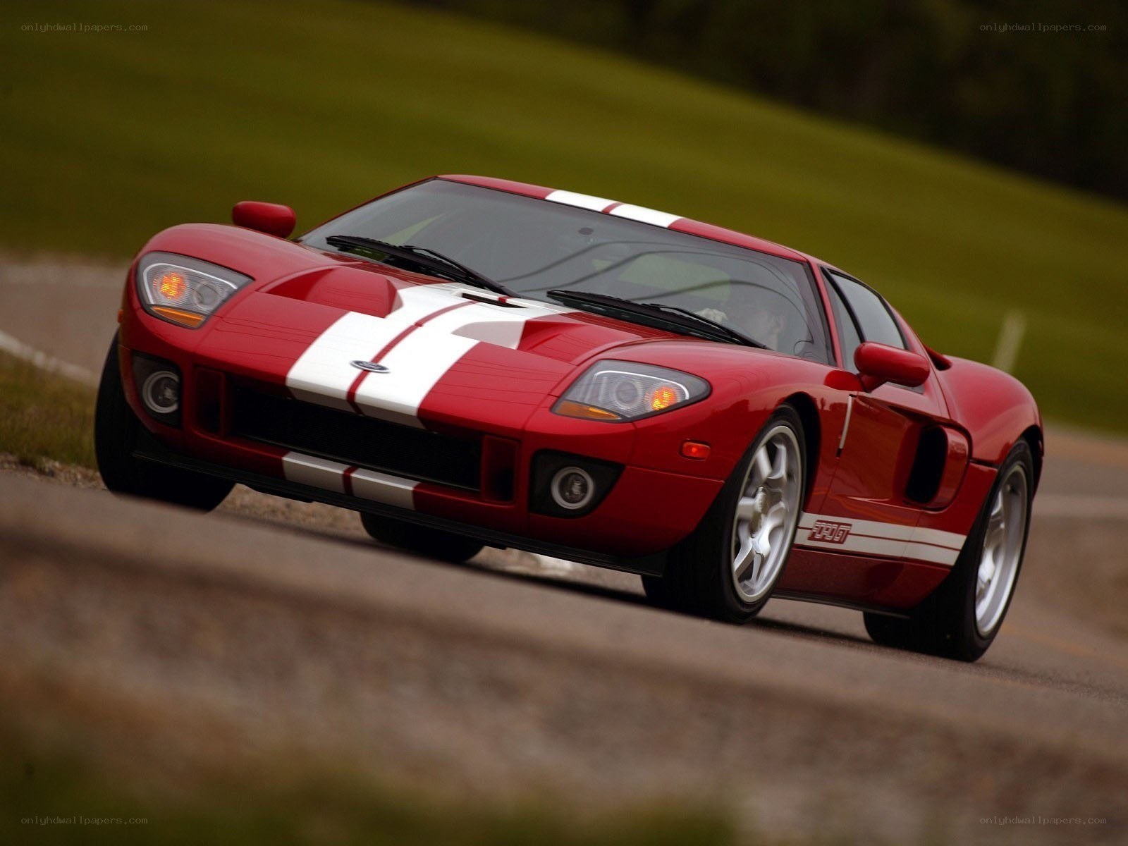 Red Ford GT on a road
