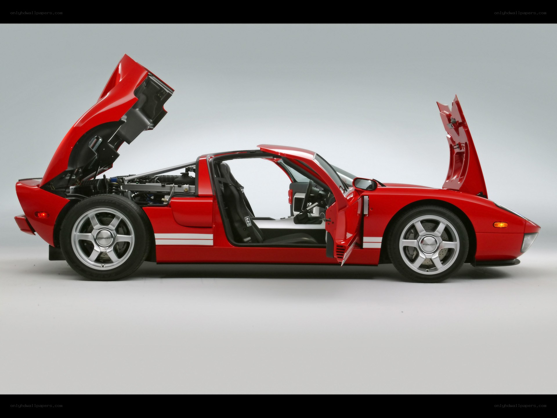 Red Ford GT with doors open