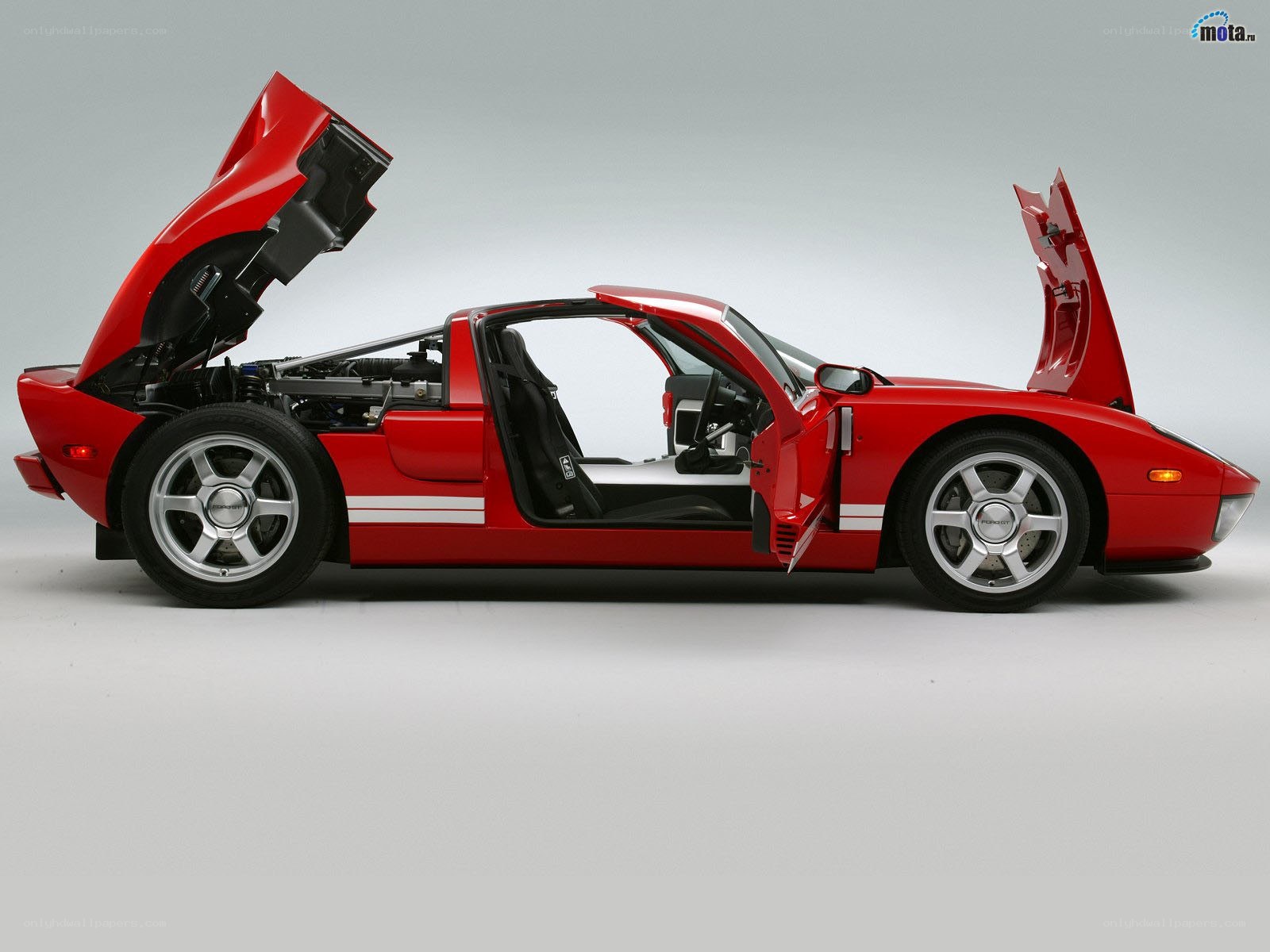 Red Ford GT with doors open