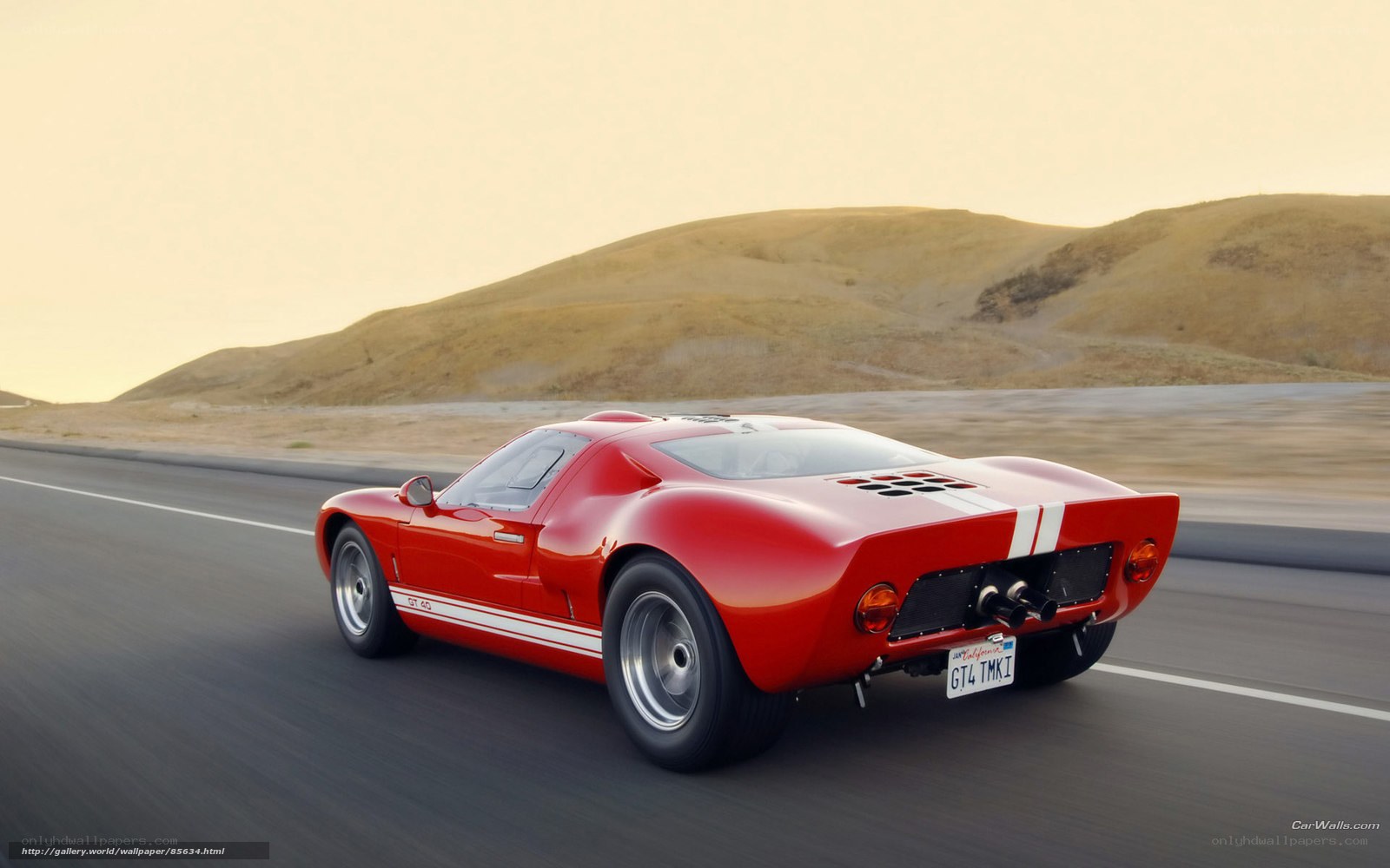 Red Ford GT40 on a desert road