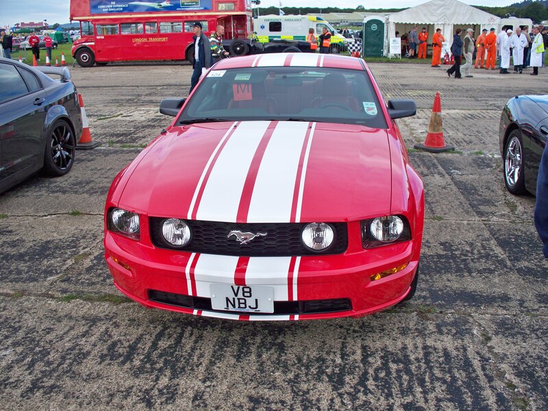 Red Ford Mustang at car show