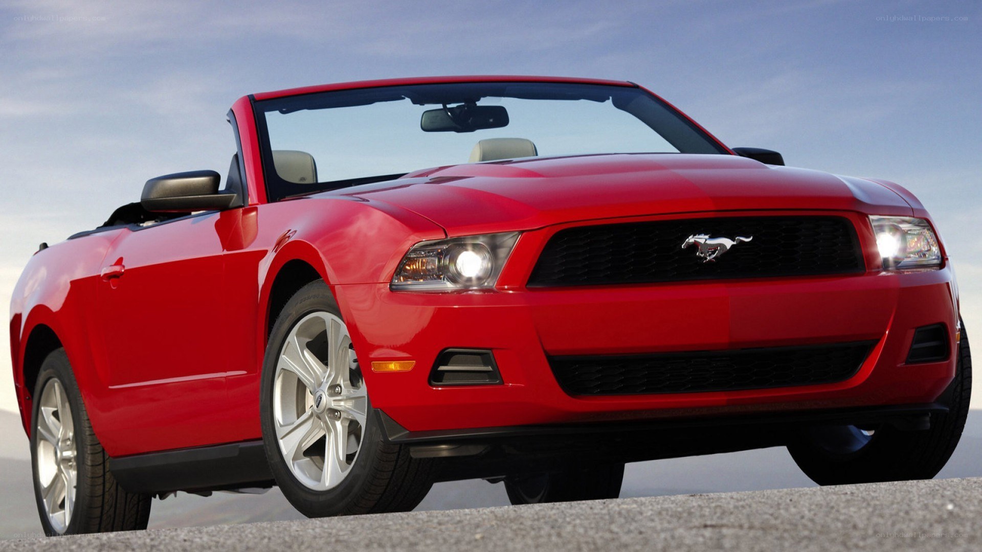 Red Ford Mustang convertible