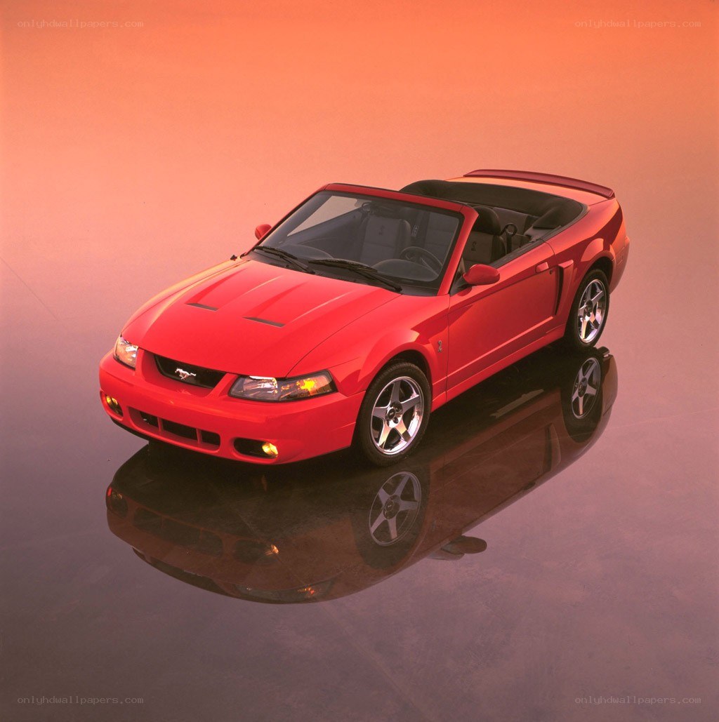 Red Ford Mustang convertible