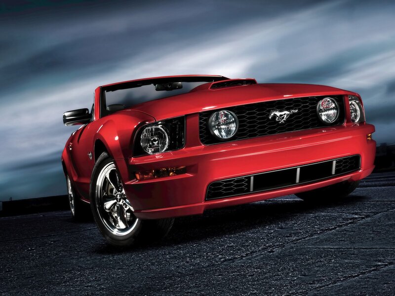 Red Ford Mustang convertible