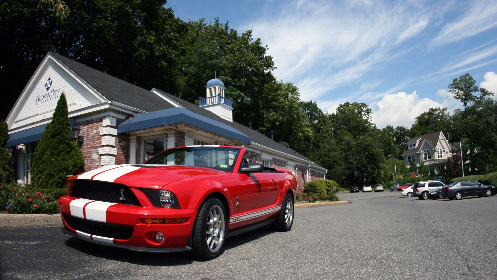 Red Ford Mustang convertible