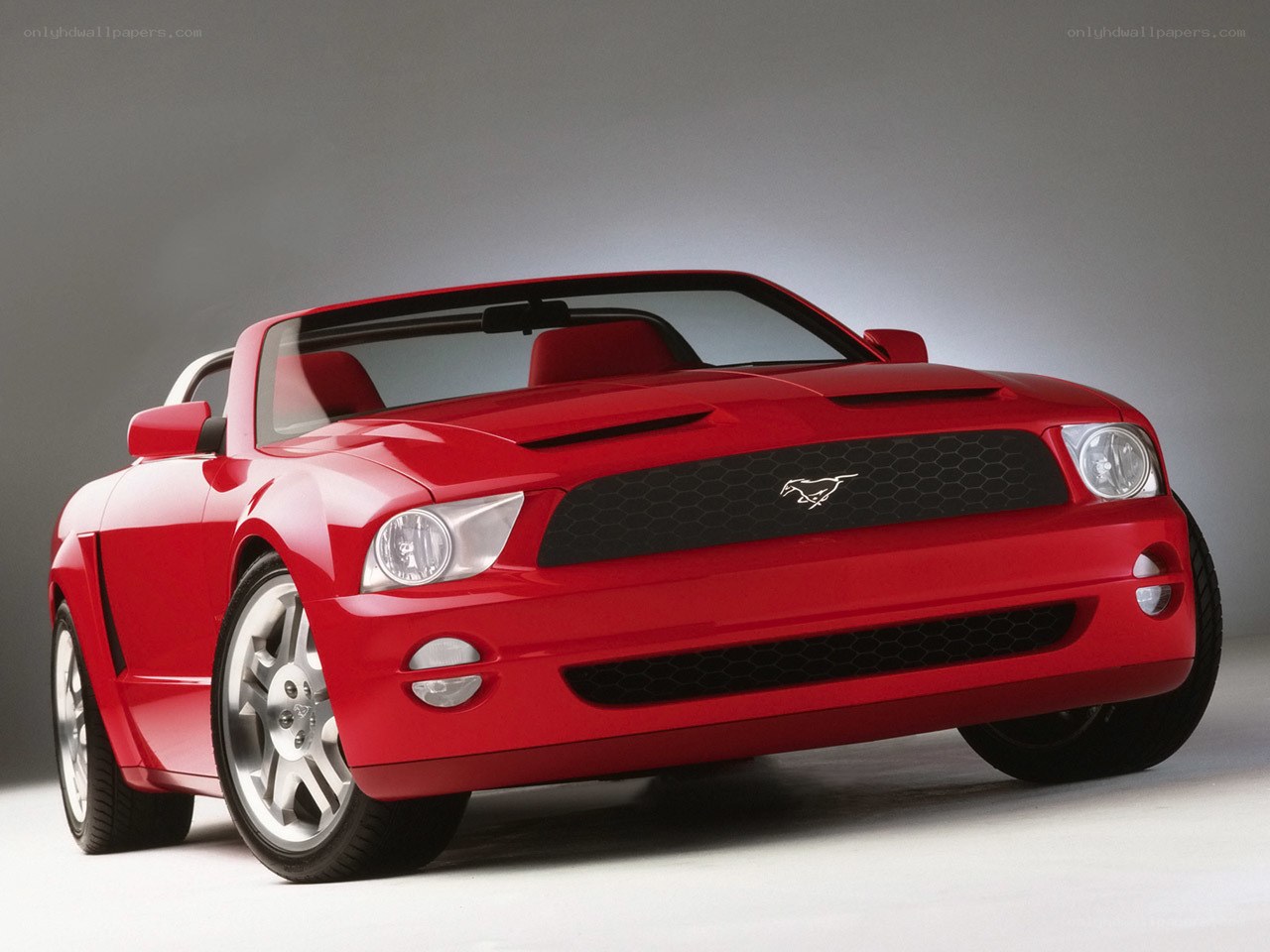 Red Ford Mustang convertible