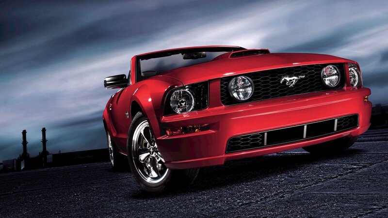 Red Ford Mustang convertible