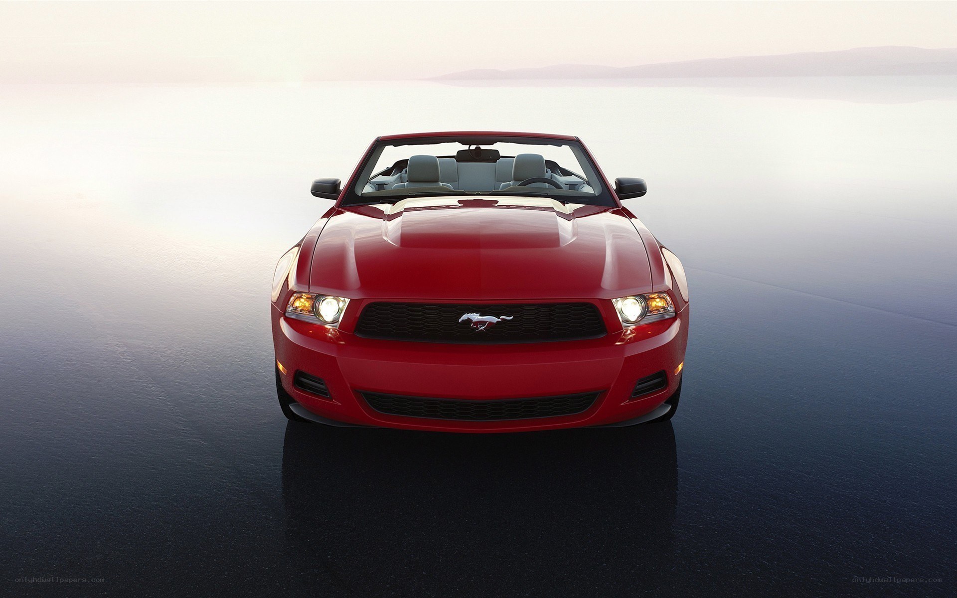 Red Ford Mustang convertible