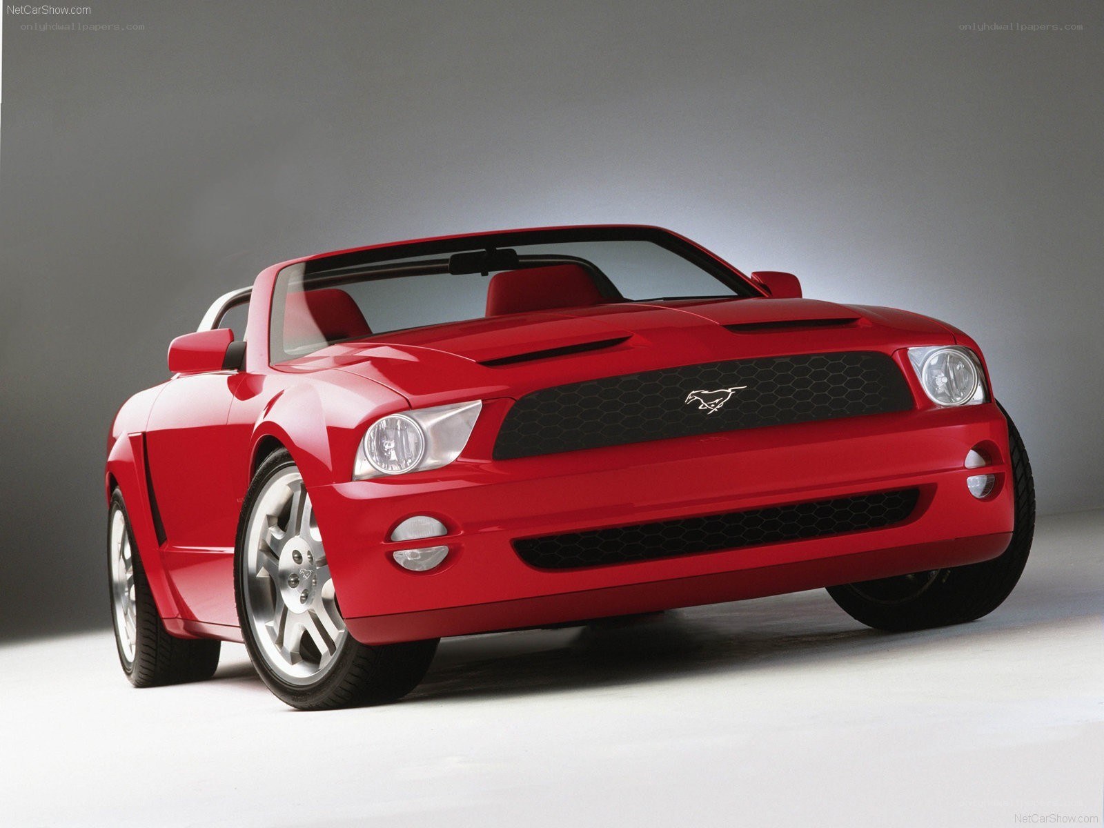 Red Ford Mustang convertible