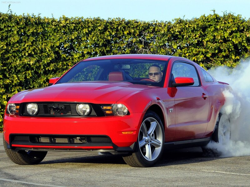 Red Ford Mustang GT burnout