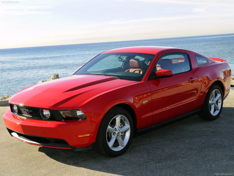 Red Ford Mustang GT by the ocean