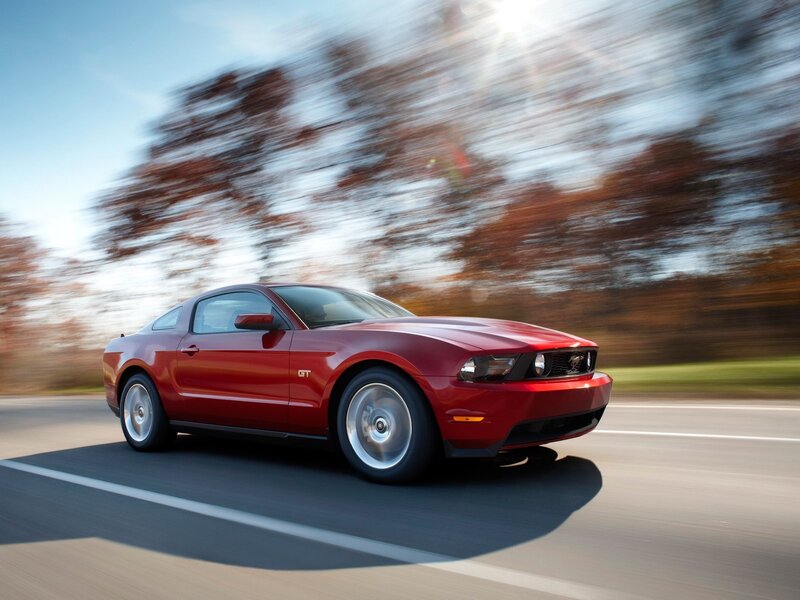 Red Ford Mustang GT in motion