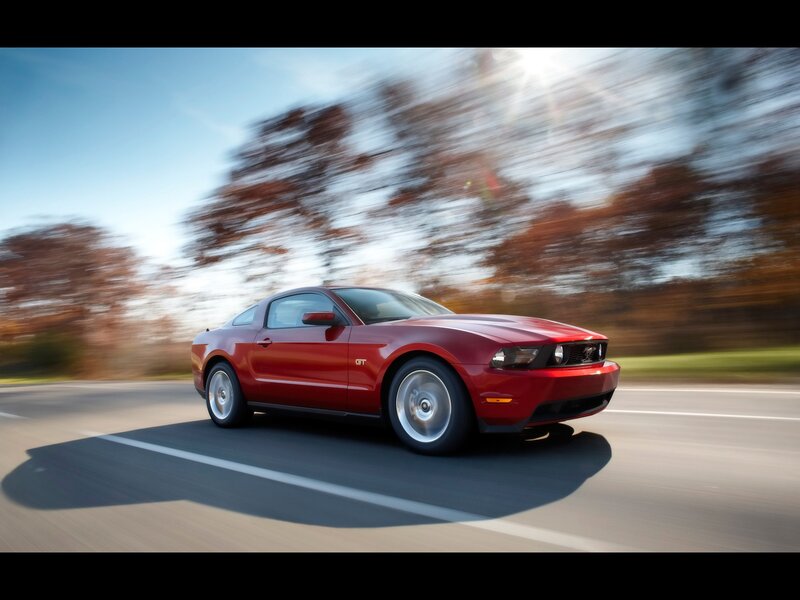 Red Ford Mustang GT in motion