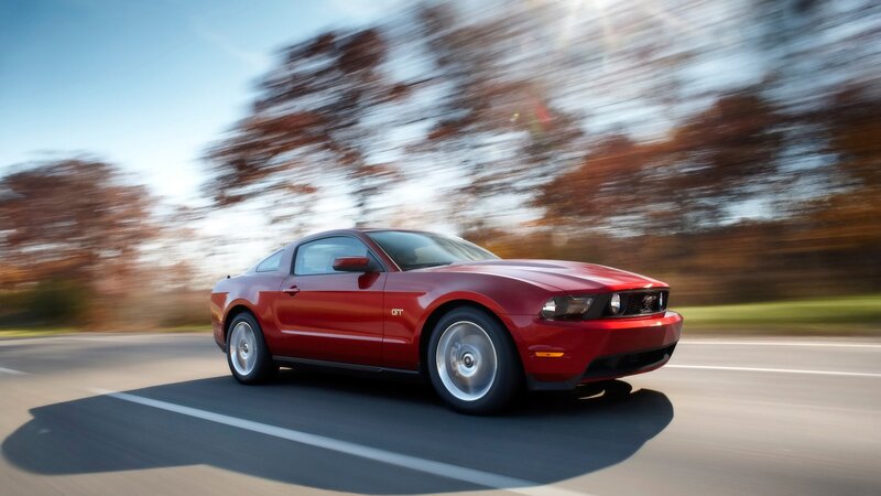 Red Ford Mustang GT in motion