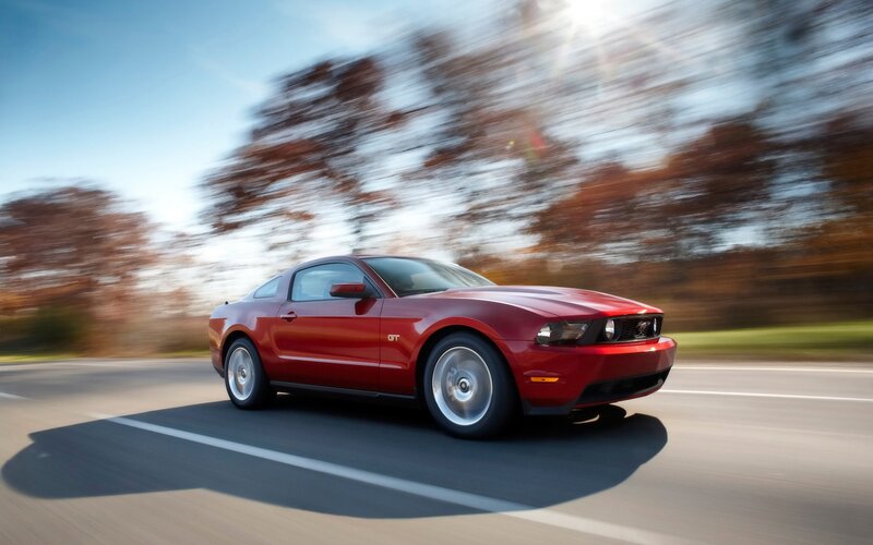 Red Ford Mustang GT in motion