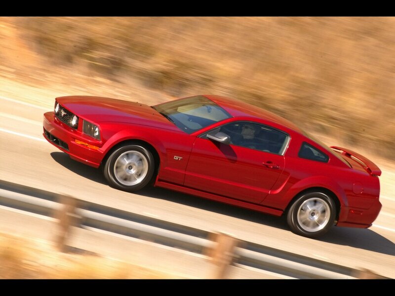 Red Ford Mustang GT in motion