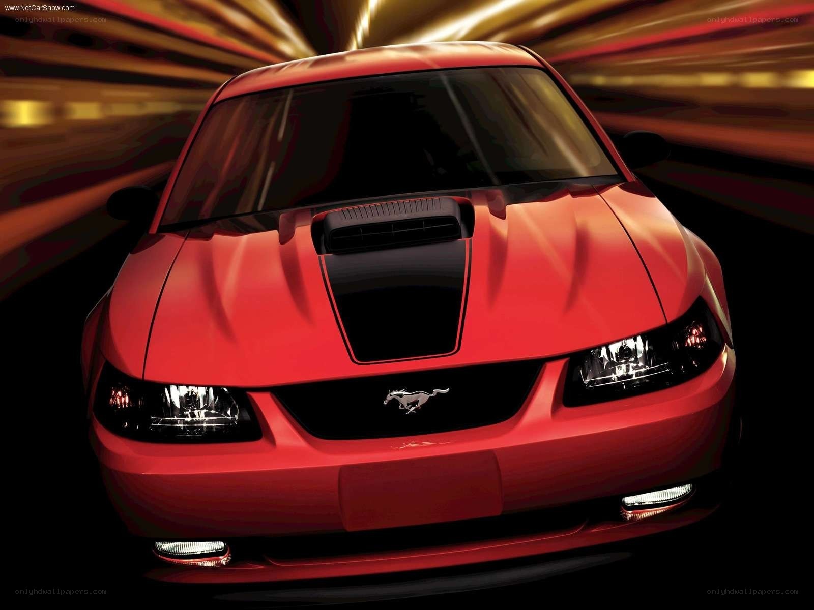 Red Ford Mustang in motion