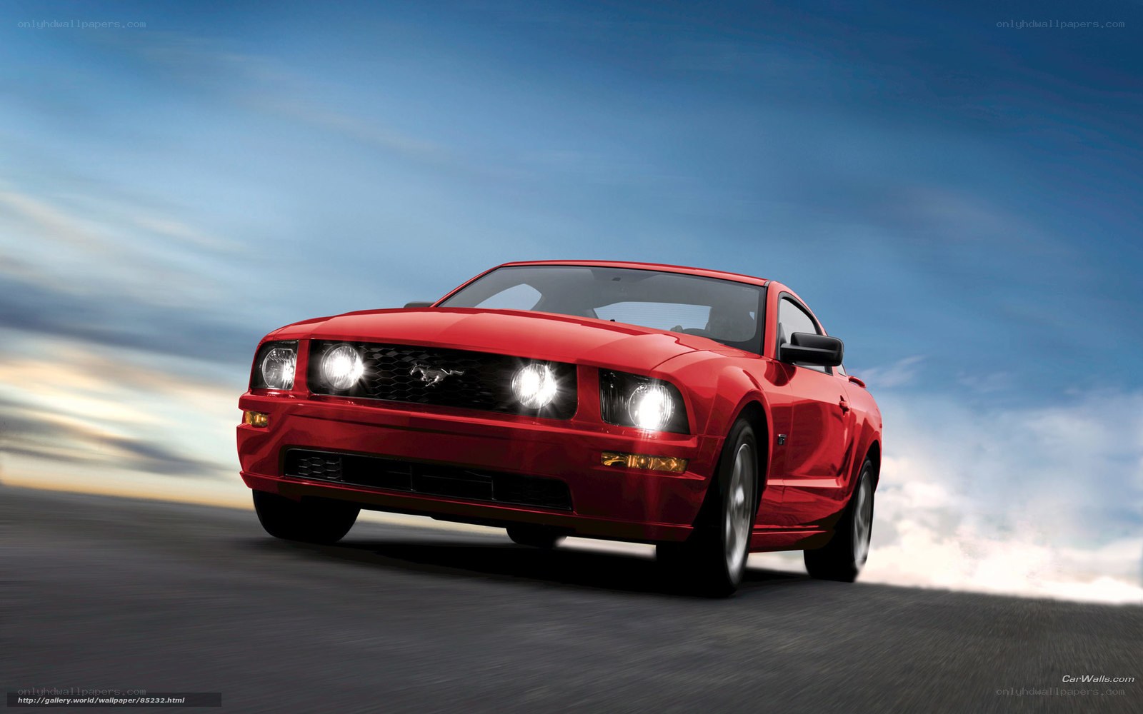 Red Ford Mustang in motion