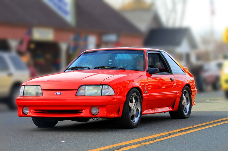 Red Ford Mustang on a street
