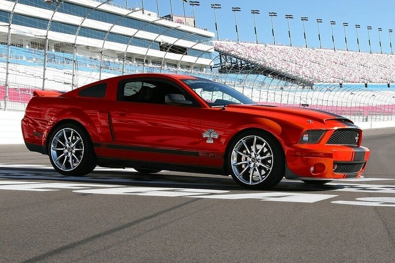 Red Ford Mustang on racetrack