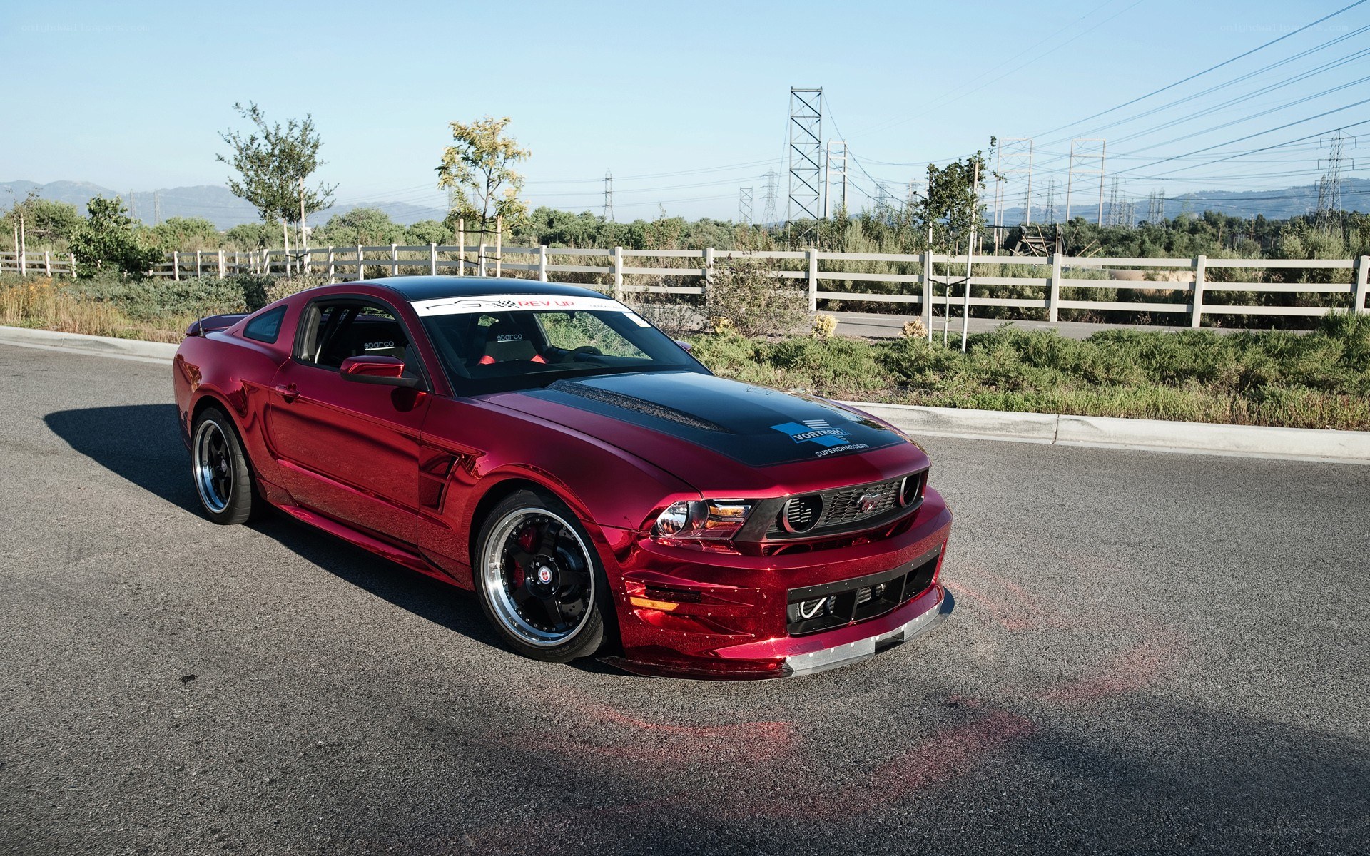 Red Ford Mustang on road