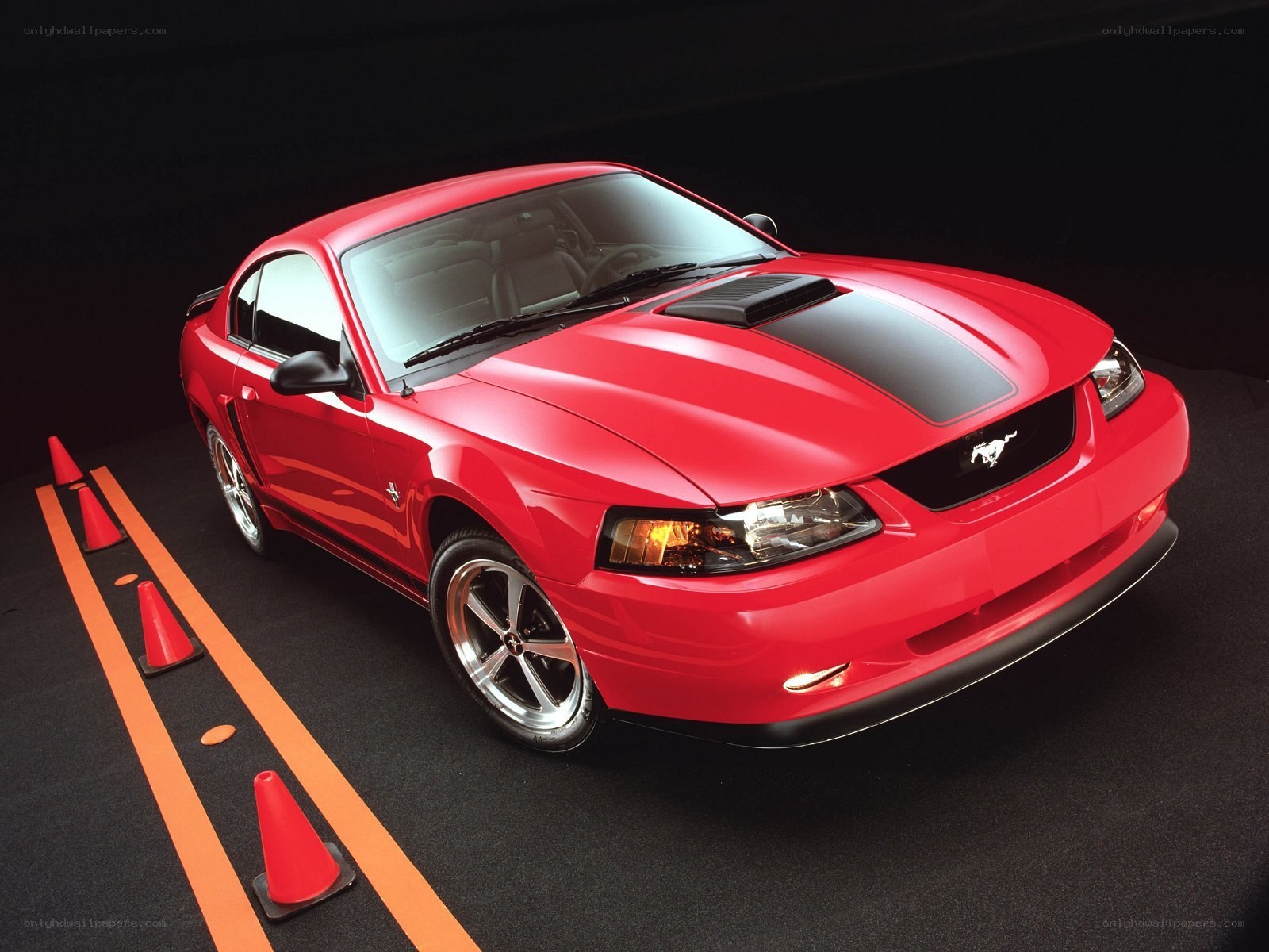 Red Ford Mustang on track