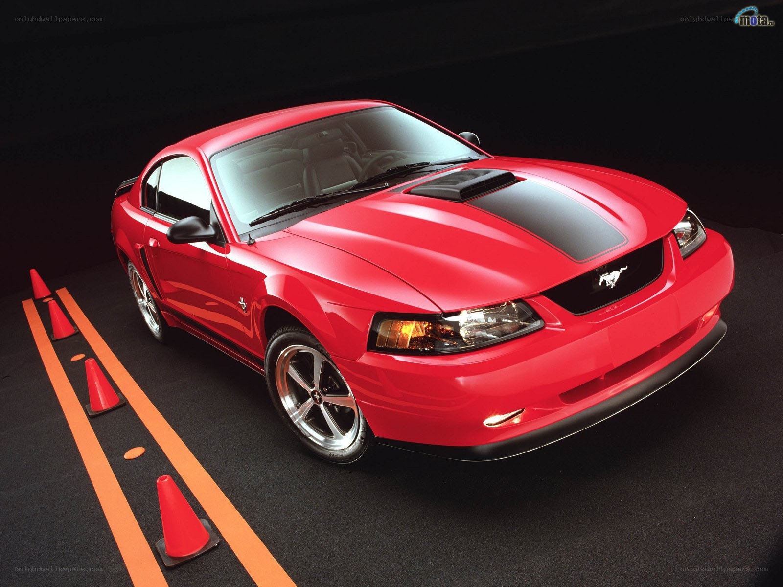 Red Ford Mustang on track