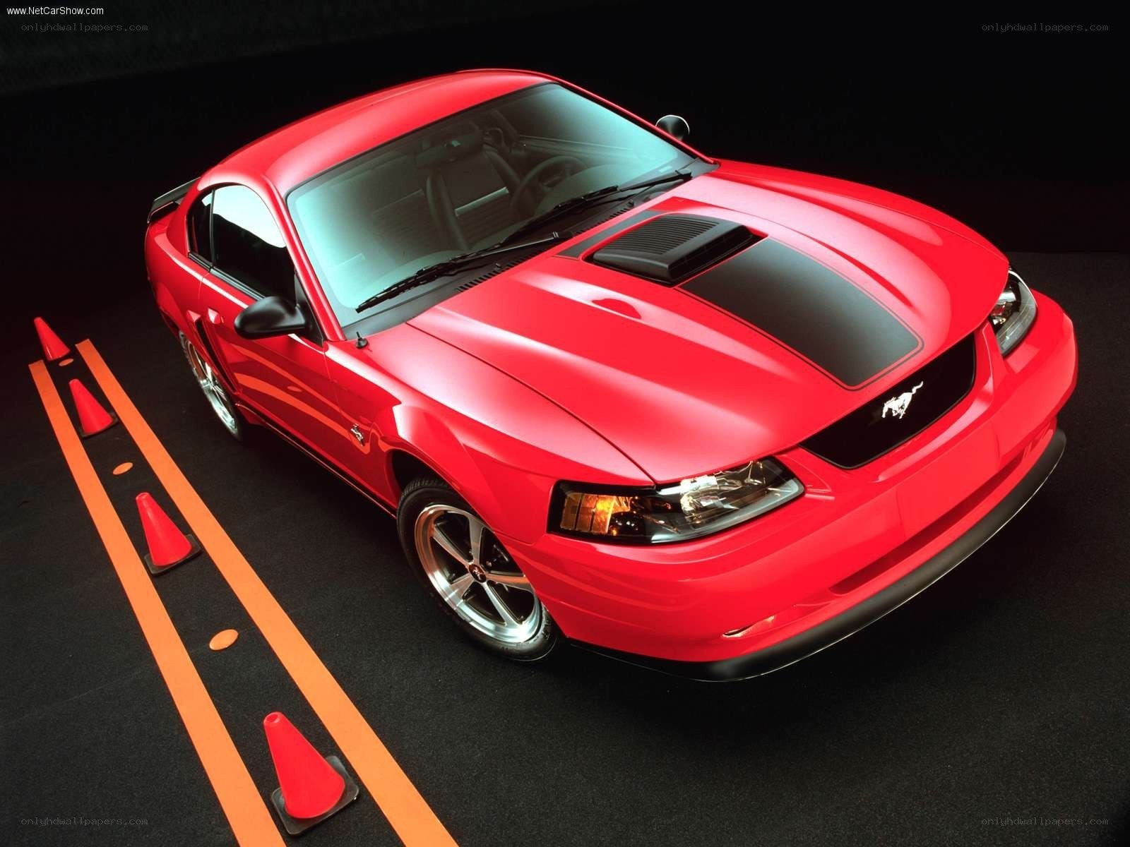 Red Ford Mustang on track