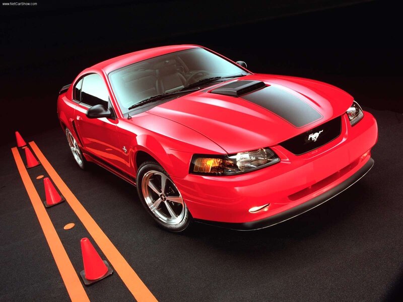 Red Ford Mustang with racing stripes