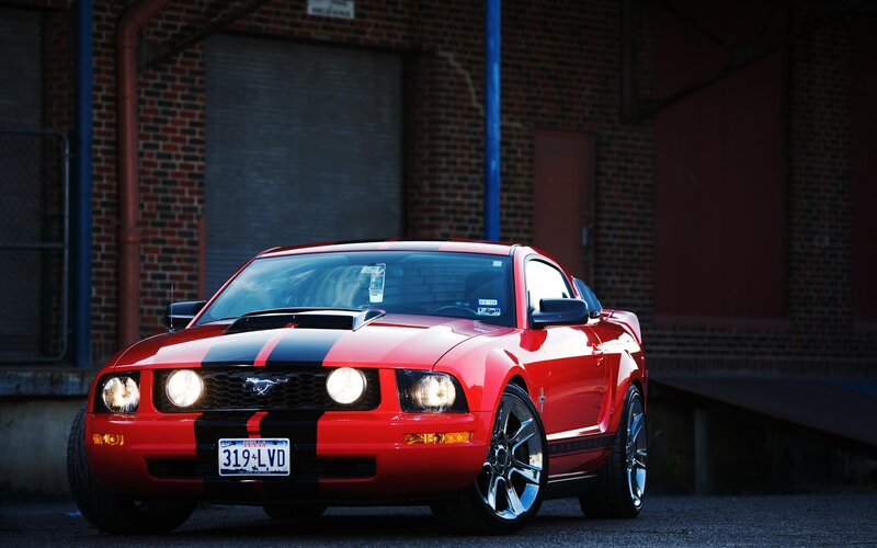 Red Ford Mustang with stripes