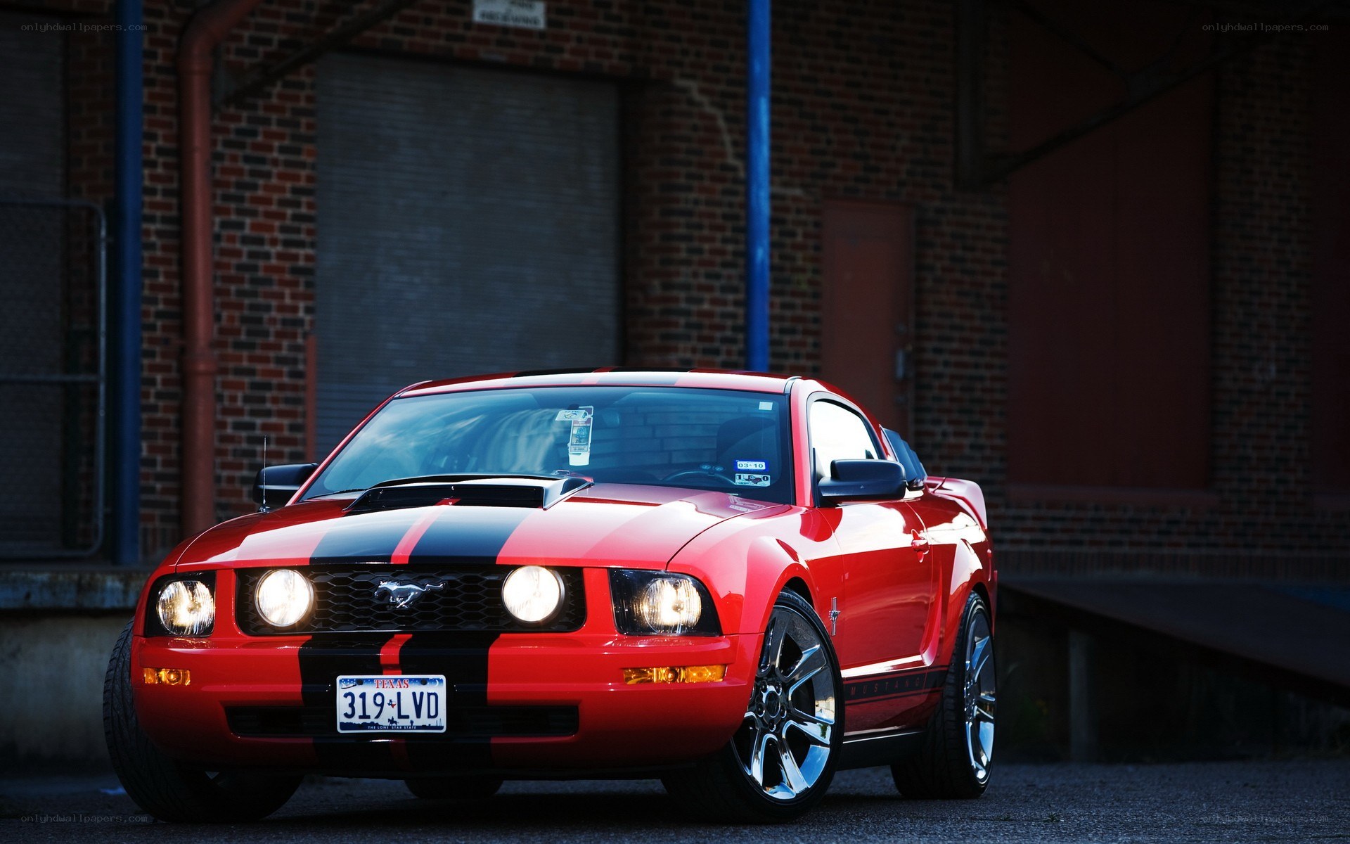 Red Ford Mustang with stripes