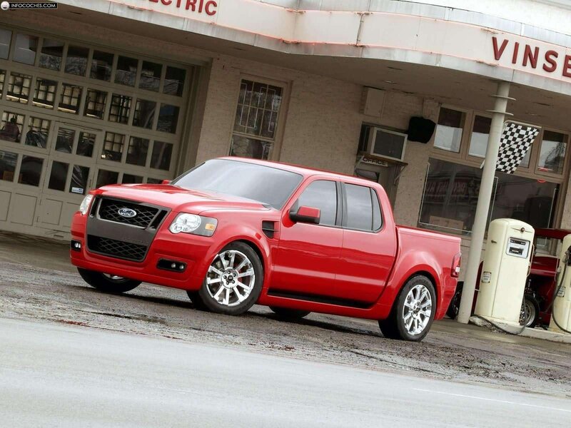 Red Ford pickup truck at gas station