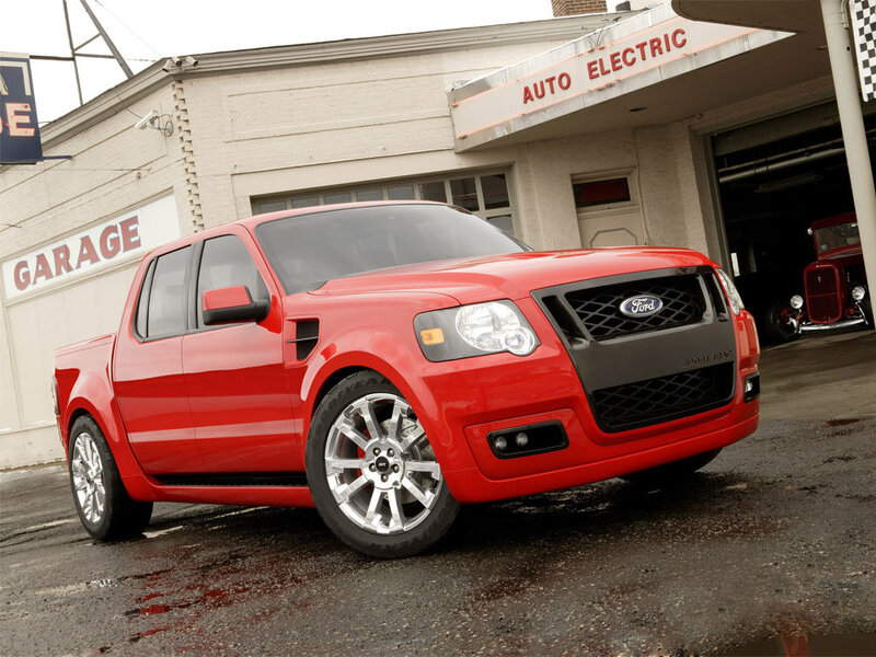 Red Ford pickup truck in garage
